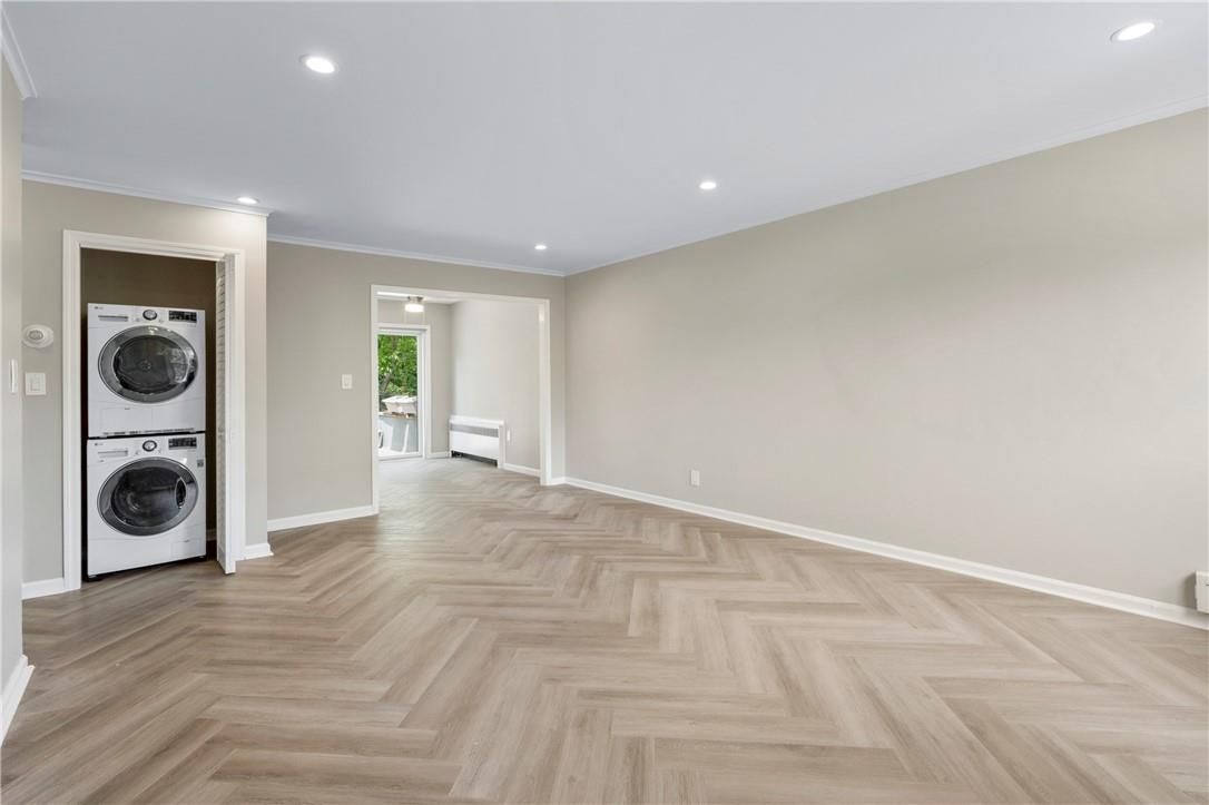 Empty room, Interior, Recessed Lighting, Utility Closets, Washer, Wood Texture Flooring