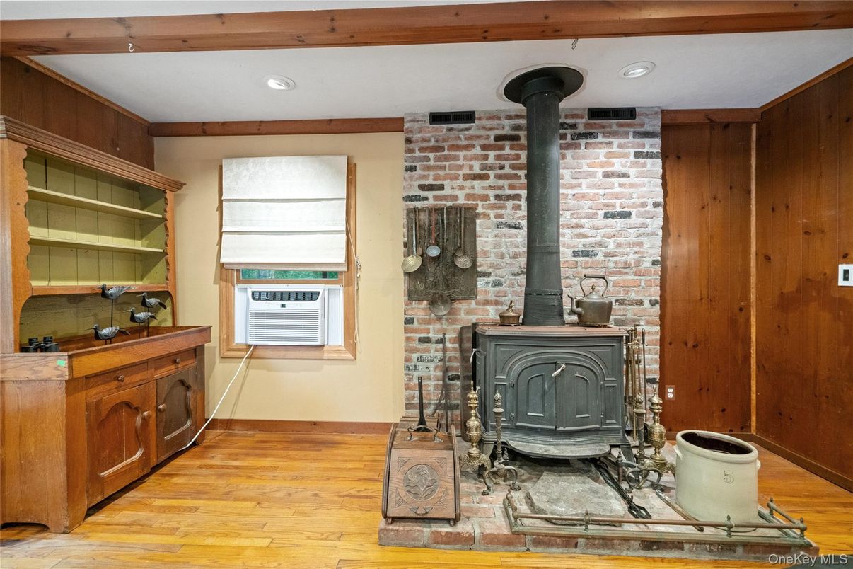 Fireplace, Interior, Recessed Lighting, Stone Walls, Wood Texture Flooring