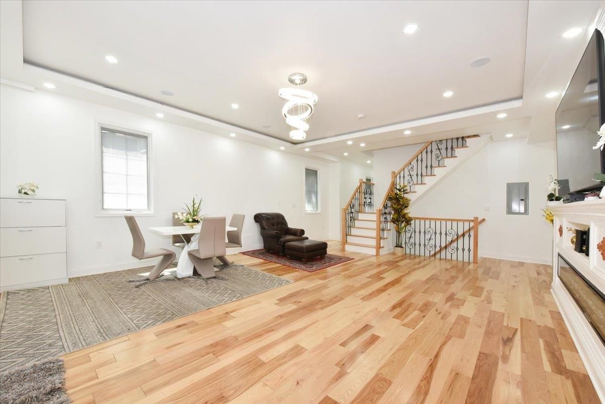 Dining room, Fireplace, Interior, Pendant Lights, Recessed Lighting, Wood Texture Flooring