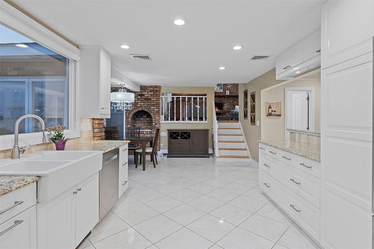 Dining room, Fireplace, Interior, Kitchen, Recessed Lighting, Stainless Steel Appliances, Stone Walls