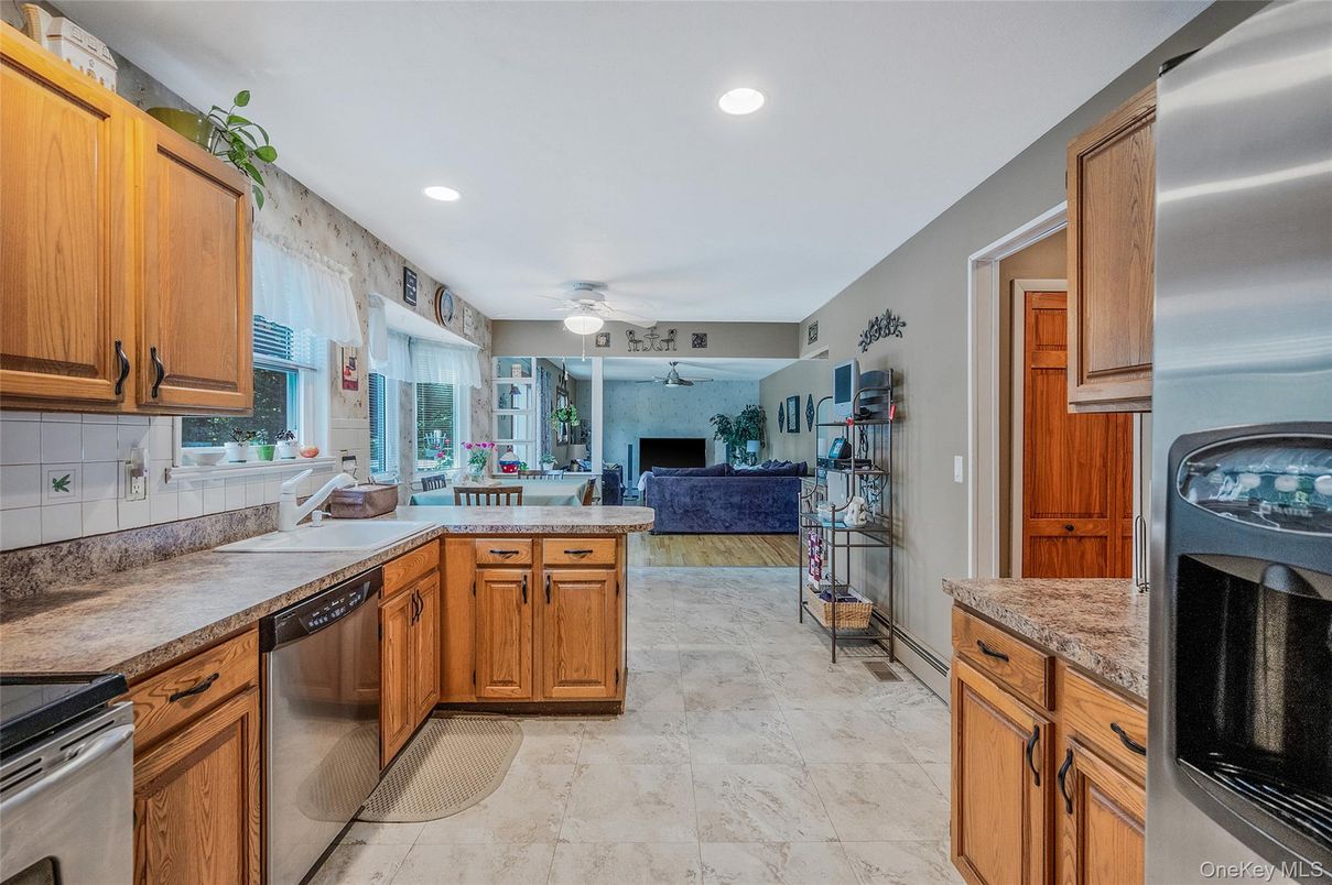 Fireplace, Interior, Kitchen, Living room, Recessed Lighting, Stainless Steel Appliances