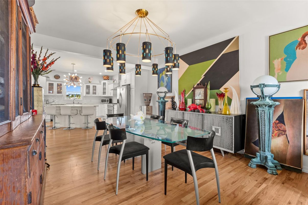 Dining room, Interior, Kitchen, Pendant Lights, Recessed Lighting, Stainless Steel Appliances, Wood Texture Flooring