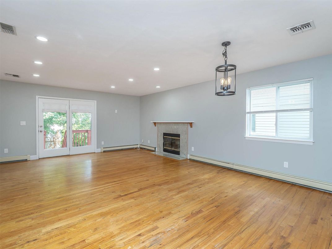 Empty room, Fireplace, Interior, Pendant Lights, Recessed Lighting, Wood Texture Flooring