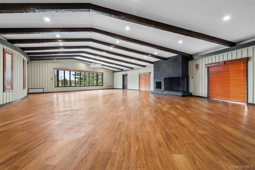 Empty room, Fireplace, Interior, Recessed Lighting, Wooden Beams, Wood Texture Flooring