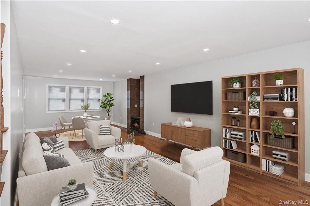 Dining room, Fireplace, Interior, Living room, Recessed Lighting, Wood Texture Flooring