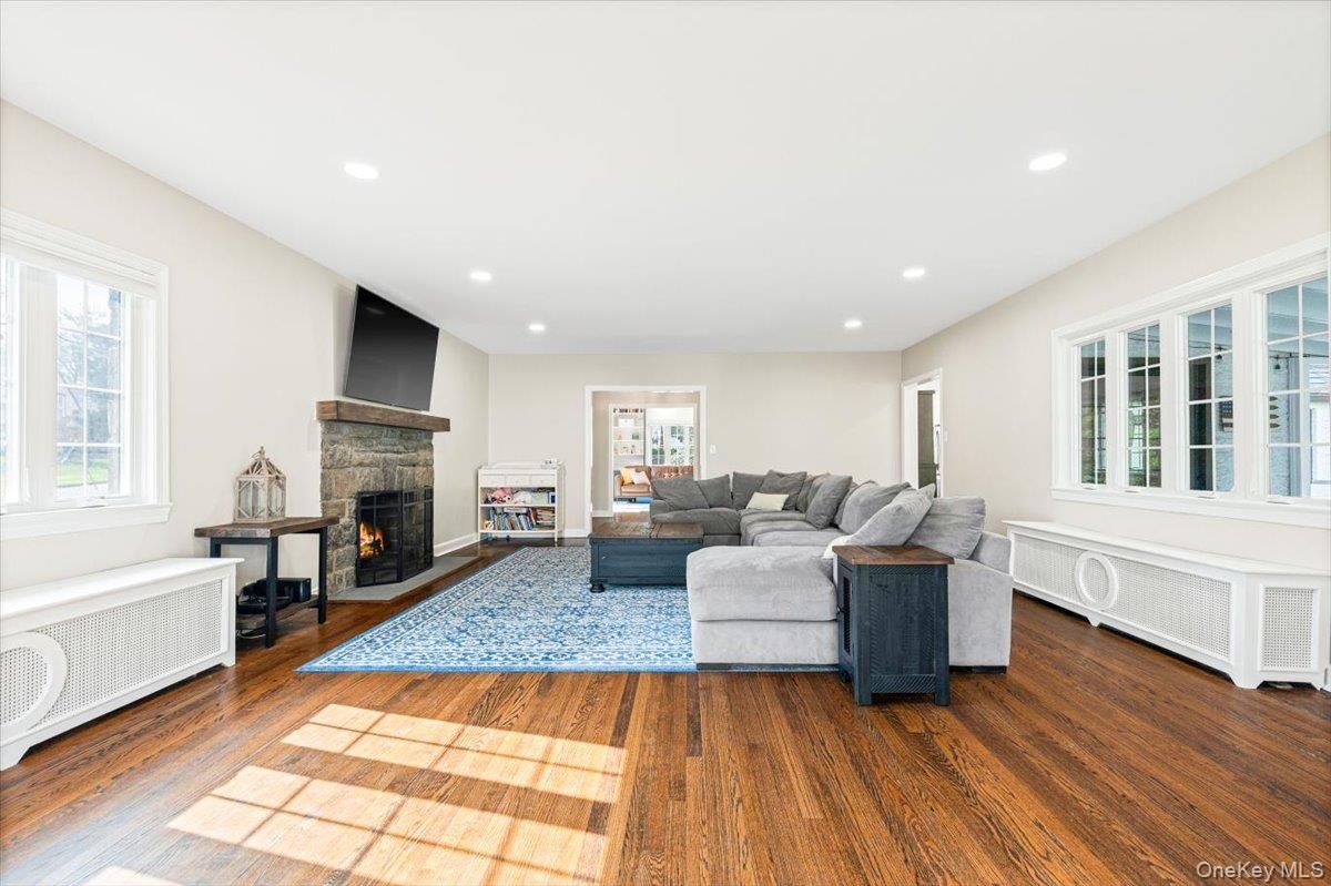 Fireplace, Interior, Living room, Recessed Lighting, Wood Texture Flooring