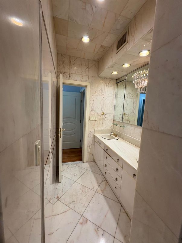 Bathroom, Dual Sink Vanities, Interior, Marble, Marble Walls, Recessed Lighting