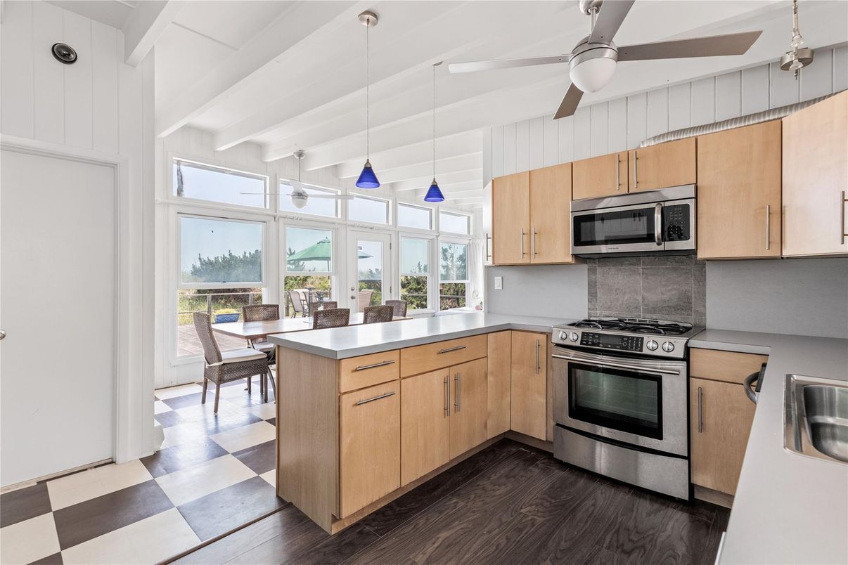 Dining room, Interior, Kitchen, Pendant Lights, Stainless Steel Appliances, Wood Texture Flooring