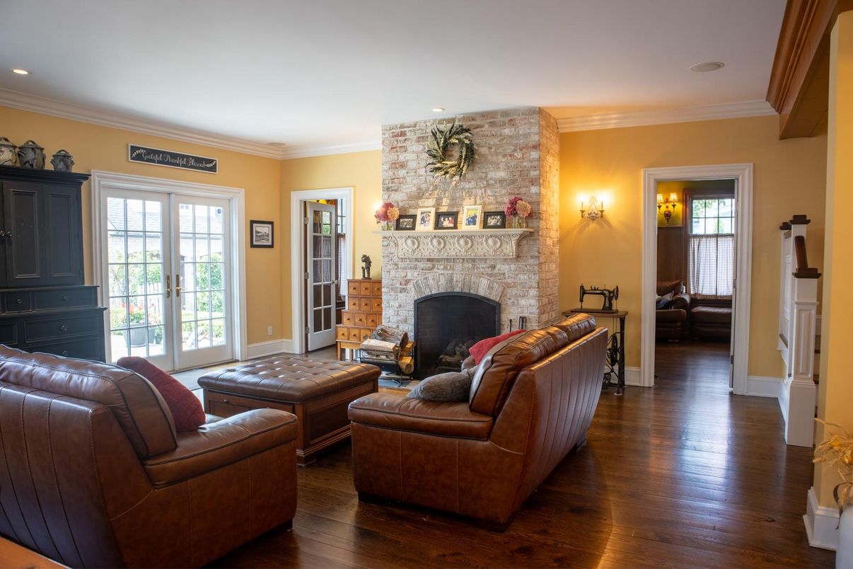 Fireplace, Interior, Living room, Recessed Lighting, Stone Walls, Wood Texture Flooring