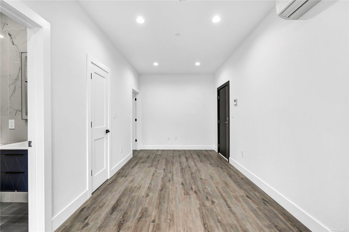 Empty room, Interior, Marble Walls, Recessed Lighting, Wood Texture Flooring