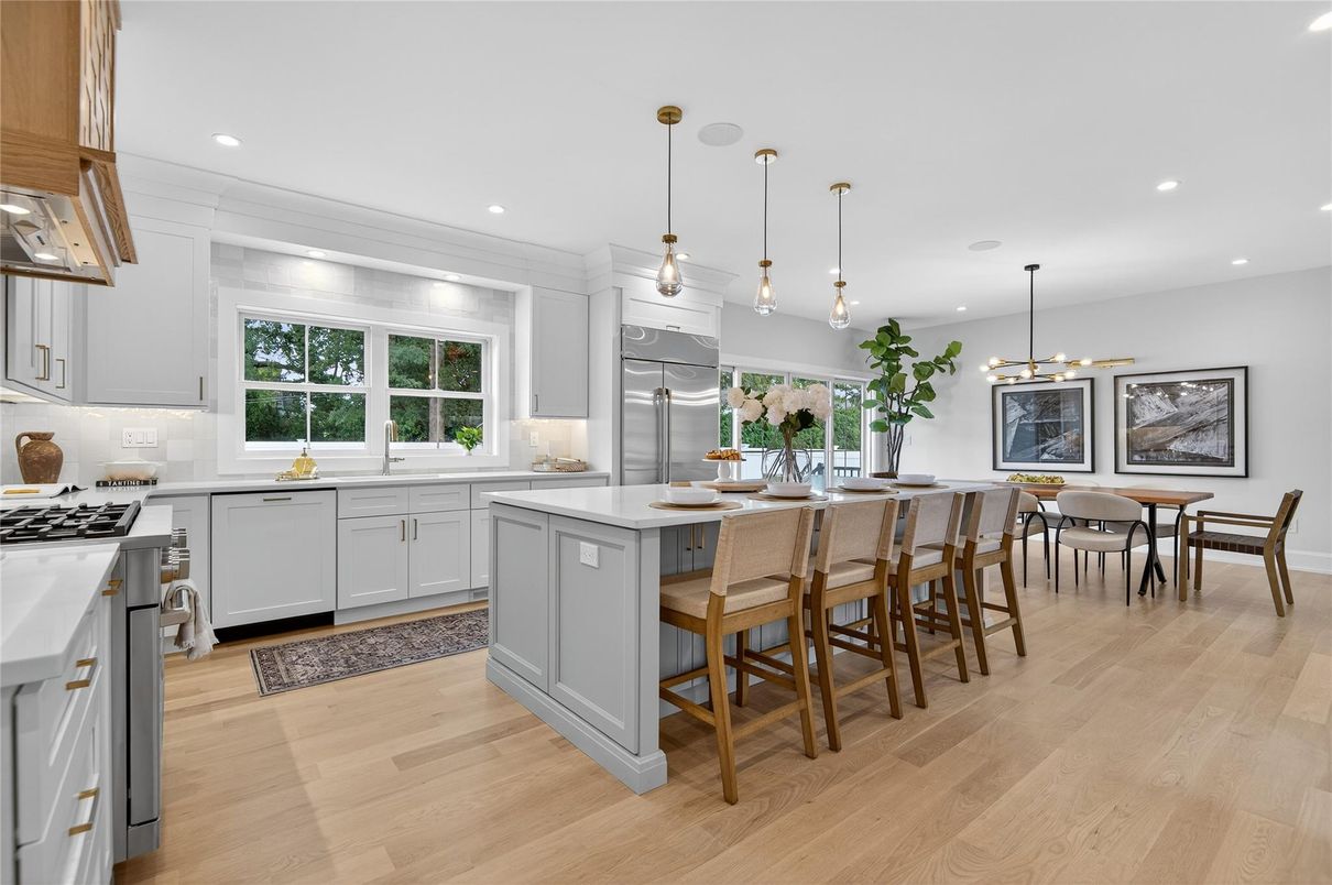 Dining room, Interior, Kitchen, Pendant Lights, Recessed Lighting, Stainless Steel Appliances, Wood Texture Flooring