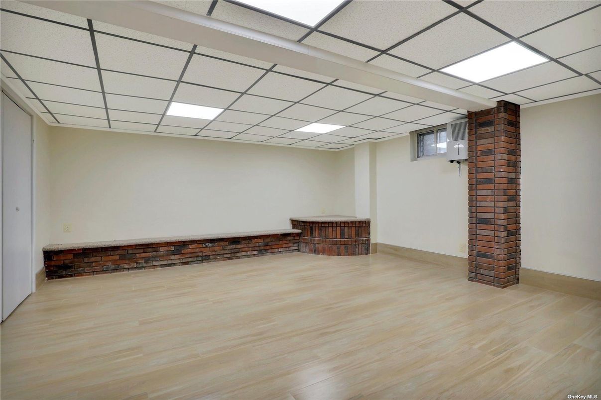 Empty room, Interior, Recessed Lighting, Stone Walls, Wood Texture Flooring