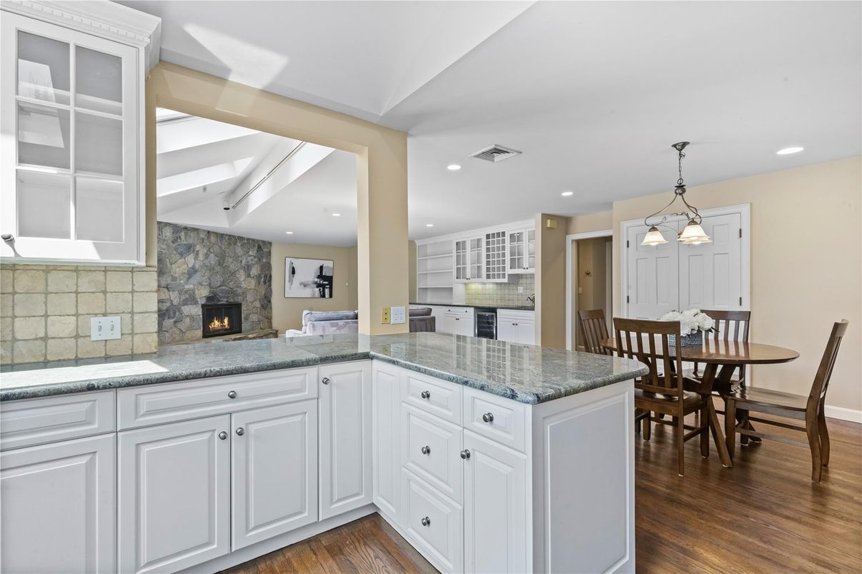 Dining room, Fireplace, Interior, Kitchen, Pendant Lights, Recessed Lighting, Wood Texture Flooring
