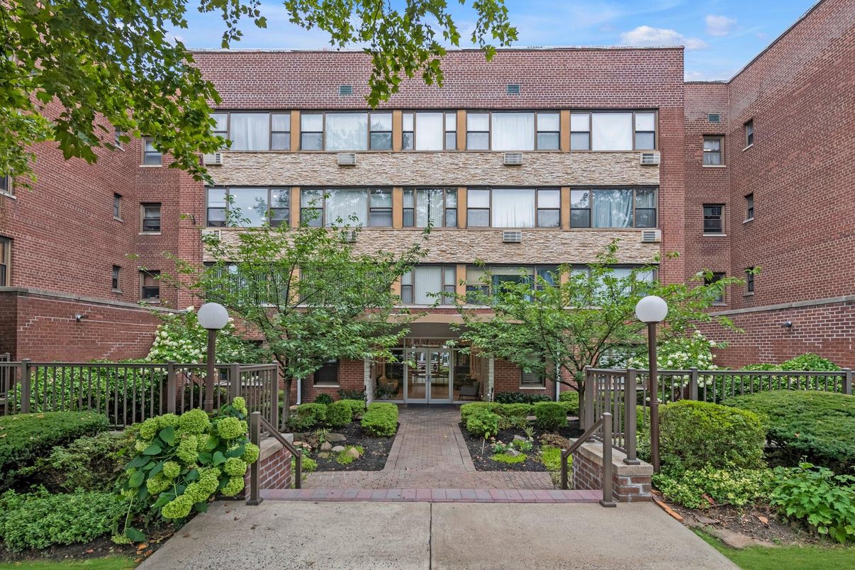 Exterior, Facade, Brick Facade, Condo Building