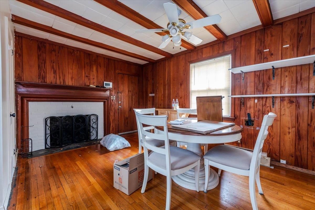 Dining room, Fireplace, Interior, Wood Texture Flooring, Wooden Walls