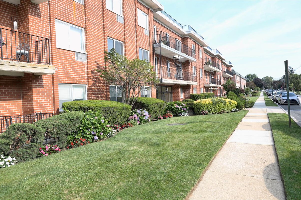 Exterior, Facade, Brick Facade, Condo Building