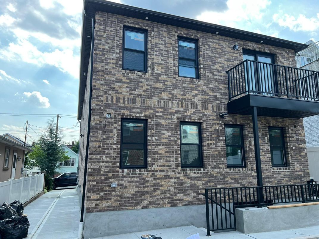 Exterior, Facade, Brick Facade, Rowhouse
