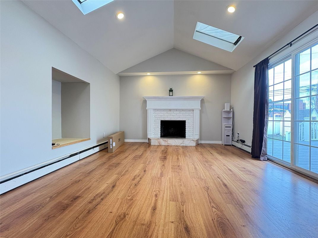 Empty room, Fireplace, Interior, Recessed Lighting, Wood Texture Flooring
