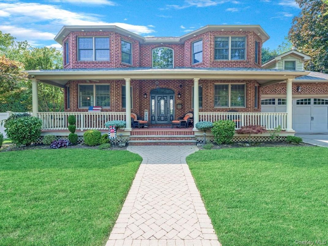 Attached, Exterior, Facade, Brick Facade, American Foursquare