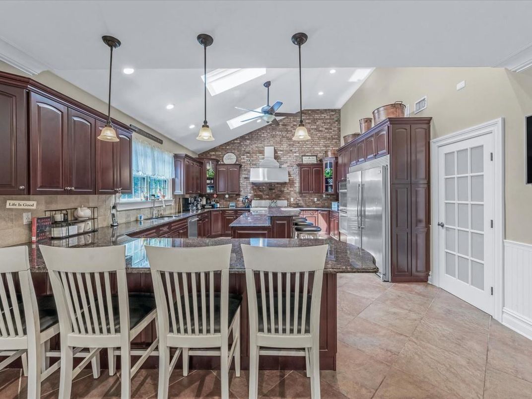 Interior, Kitchen, Pendant Lights, Recessed Lighting, Stainless Steel Appliances, Stone Walls