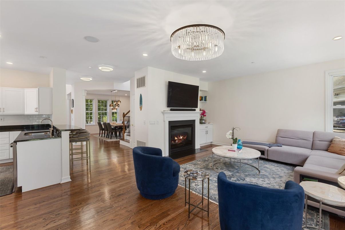 Chandelier, Dining room, Fireplace, Interior, Kitchen, Living room, Pendant Lights, Recessed Lighting, Wood Texture Flooring