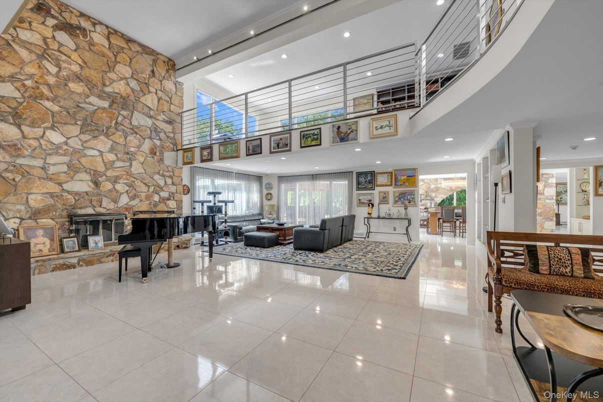 Fireplace, Interior, Living room, Piano, Recessed Lighting, Stone Walls