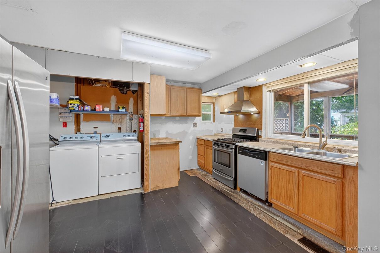 Interior, Kitchen, Recessed Lighting, Stainless Steel Appliances, Washer, Wood Texture Flooring