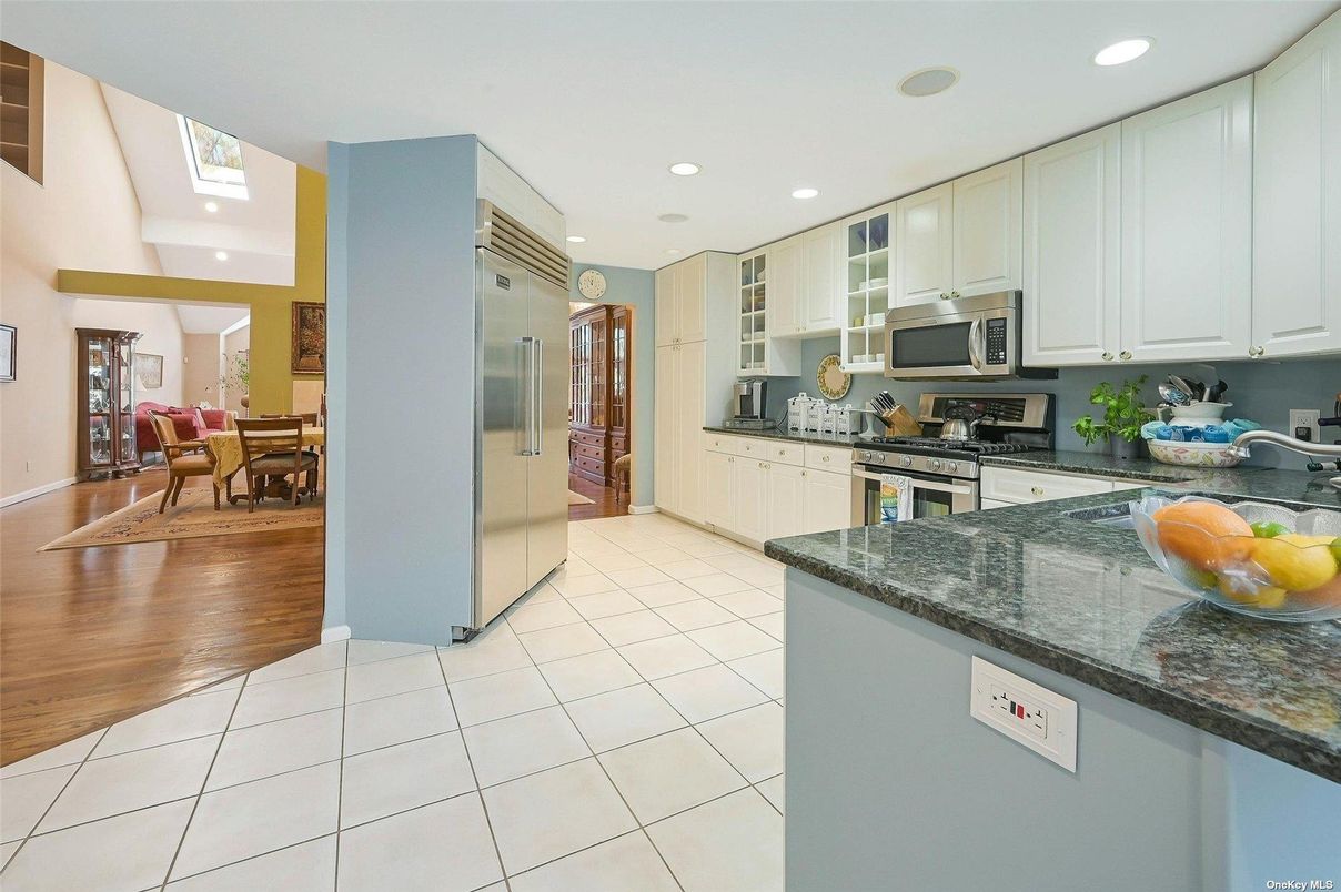 Dining room, Interior, Kitchen, Recessed Lighting, Stainless Steel Appliances, Wood Texture Flooring