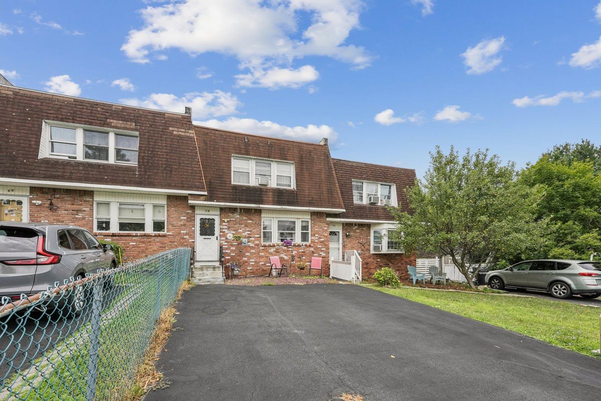 Exterior, Facade, Brick Facade, Cape Cod