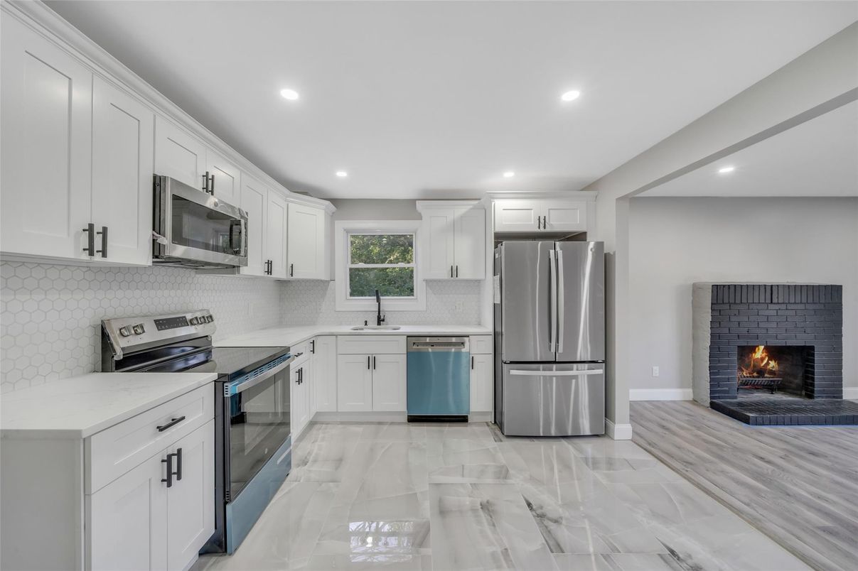 Fireplace, Interior, Kitchen, Marble, Recessed Lighting, Stainless Steel Appliances