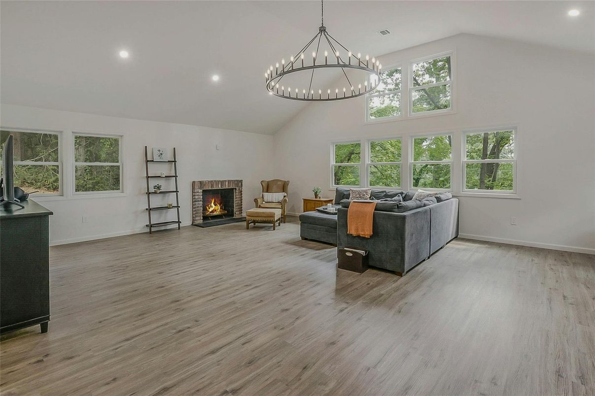 Chandelier, Fireplace, Interior, Living room, Pendant Lights, Recessed Lighting, Wood Texture Flooring