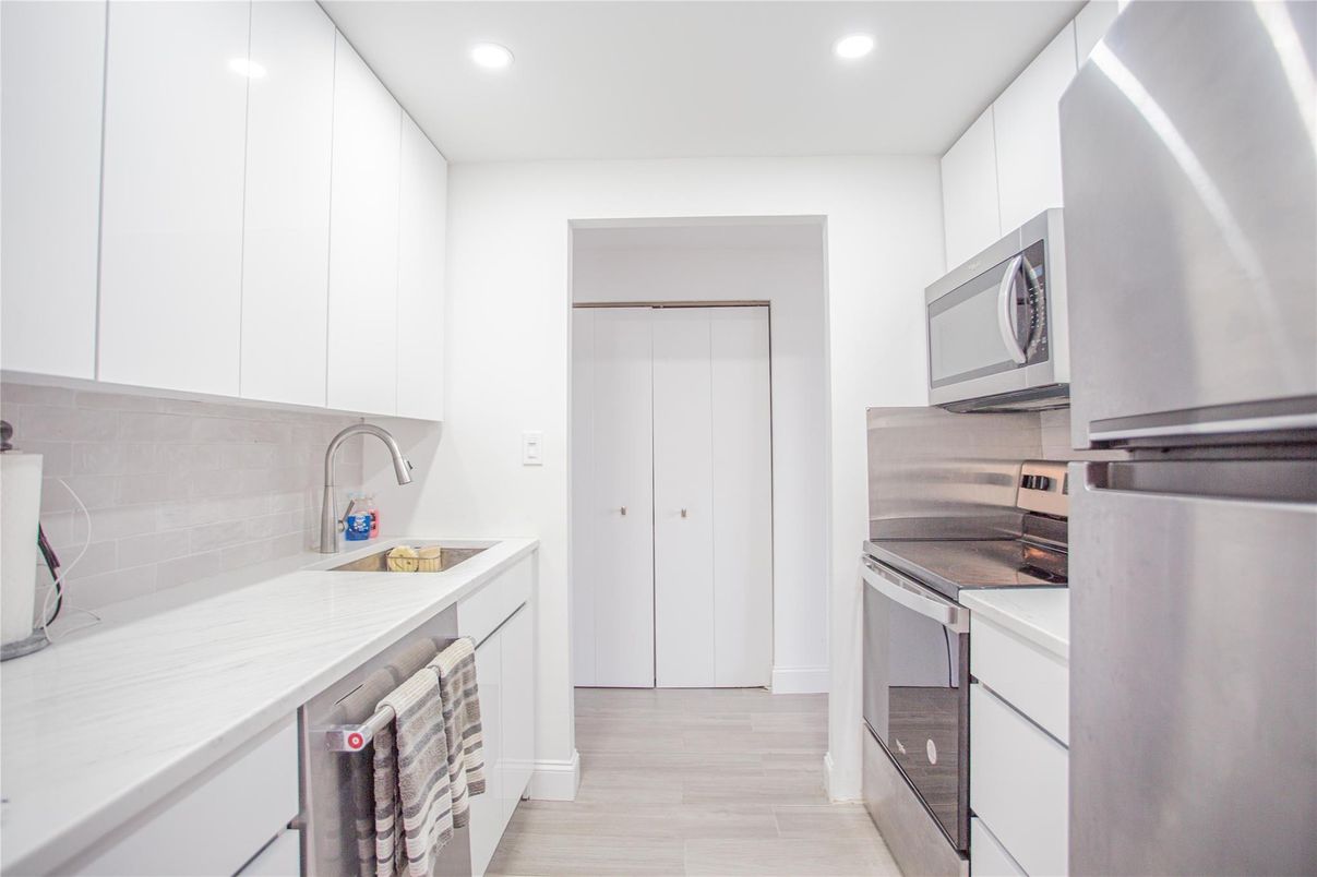 Interior, Kitchen, Recessed Lighting, Stainless Steel Appliances, Wood Texture Flooring