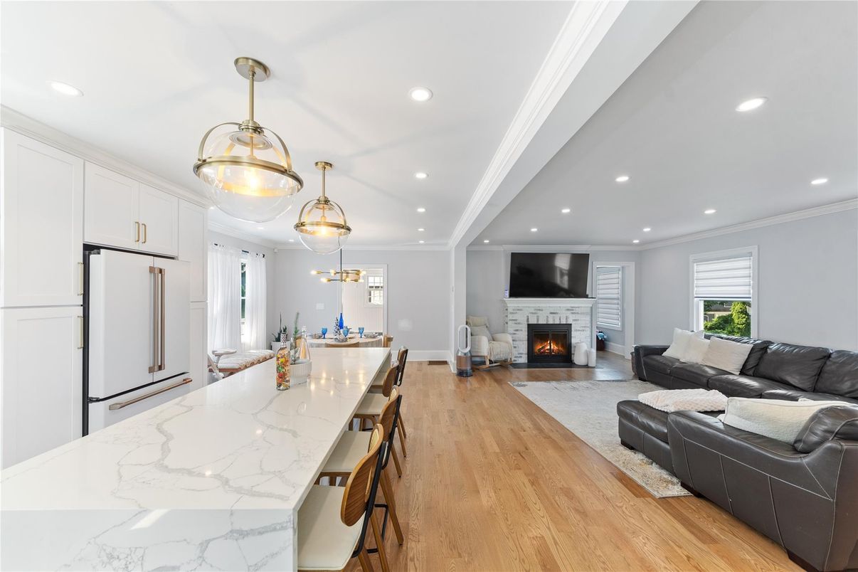 Dining room, Fireplace, Interior, Kitchen, Living room, Pendant Lights, Recessed Lighting, Wood Texture Flooring