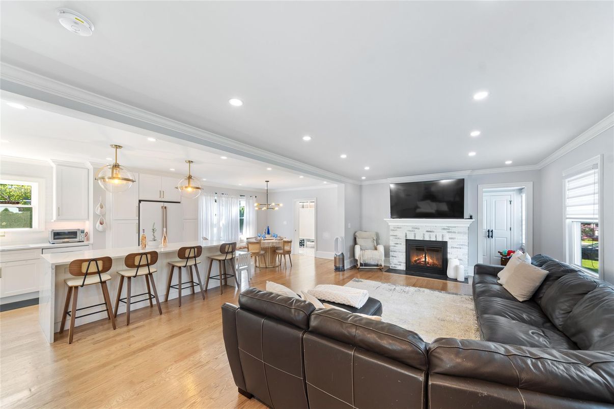 Dining room, Fireplace, Interior, Kitchen, Living room, Pendant Lights, Recessed Lighting, Wood Texture Flooring