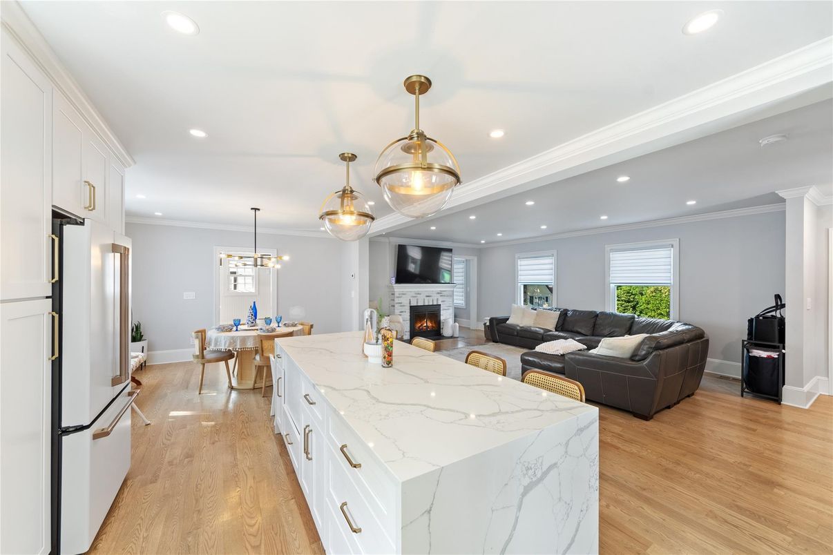 Dining room, Fireplace, Interior, Kitchen, Living room, Pendant Lights, Recessed Lighting, Wood Texture Flooring