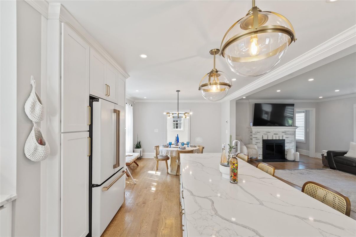 Dining room, Fireplace, Interior, Kitchen, Living room, Pendant Lights, Recessed Lighting, Wood Texture Flooring