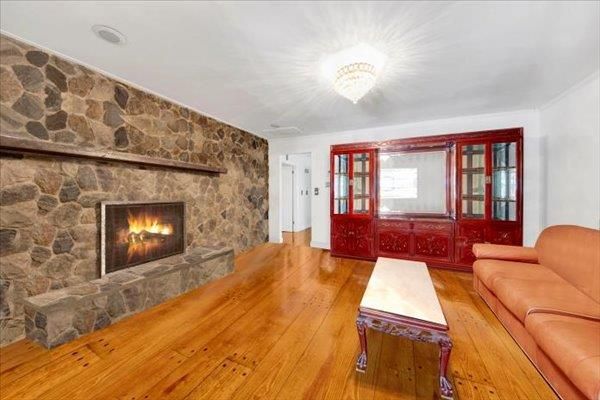Chandelier, Fireplace, Interior, Living room, Stone Walls, Wood Texture Flooring