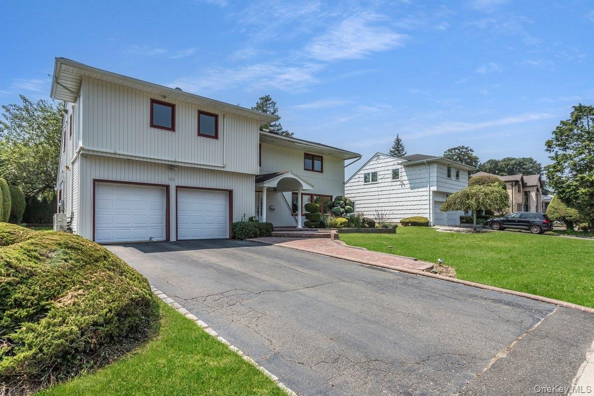 Attached, Exterior, Facade, Raised Ranch