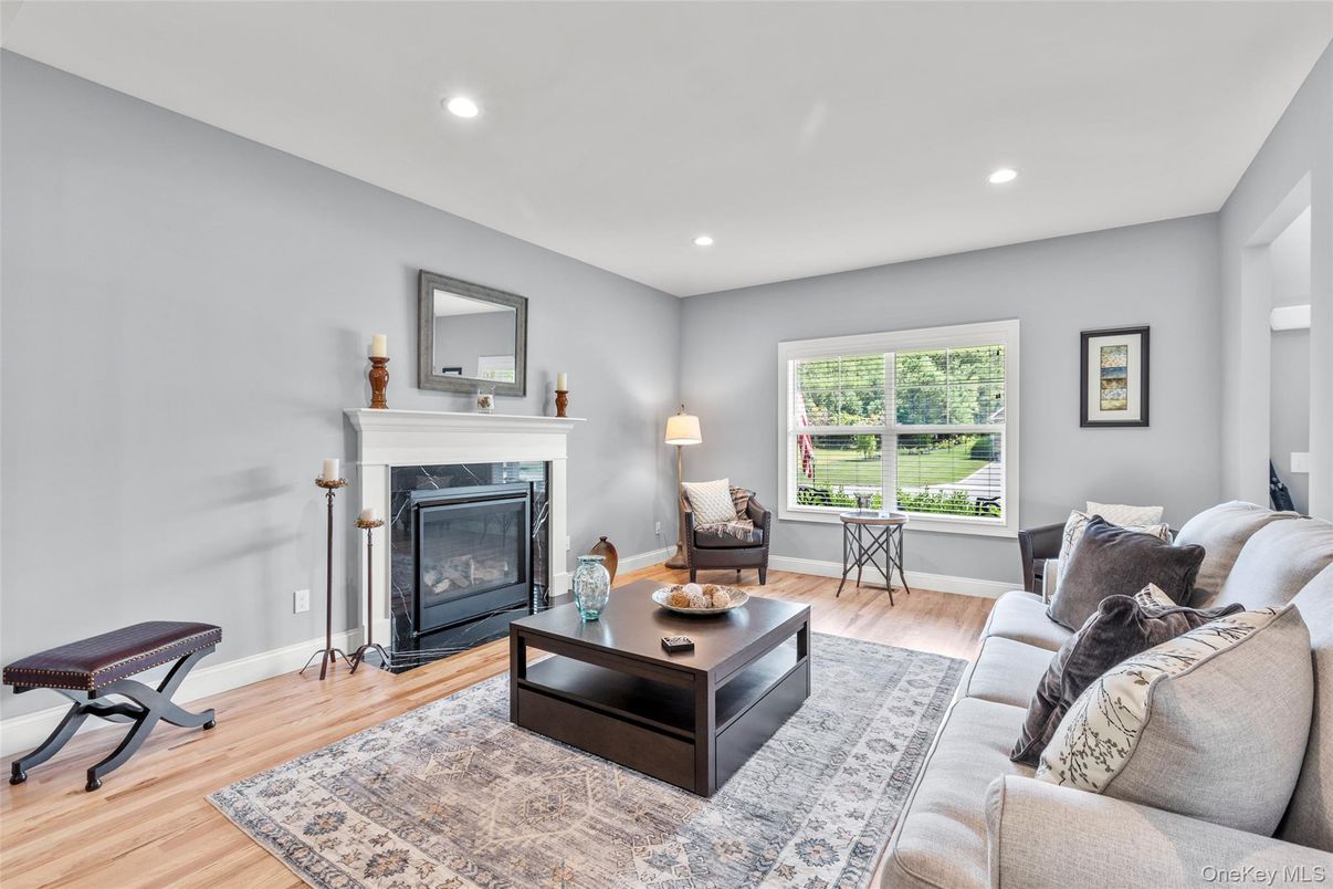 Fireplace, Interior, Living room, Recessed Lighting, Wood Texture Flooring