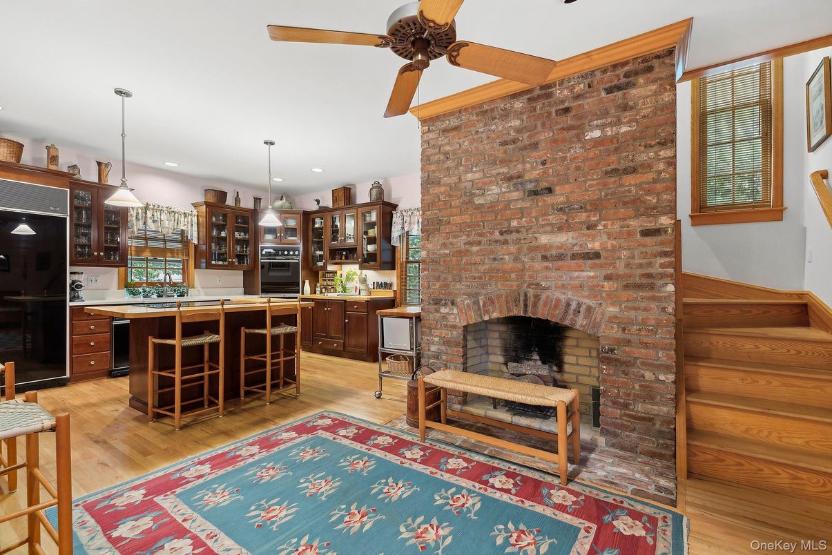 Fireplace, Interior, Kitchen, Pendant Lights, Recessed Lighting, Stone Walls, Wood Texture Flooring