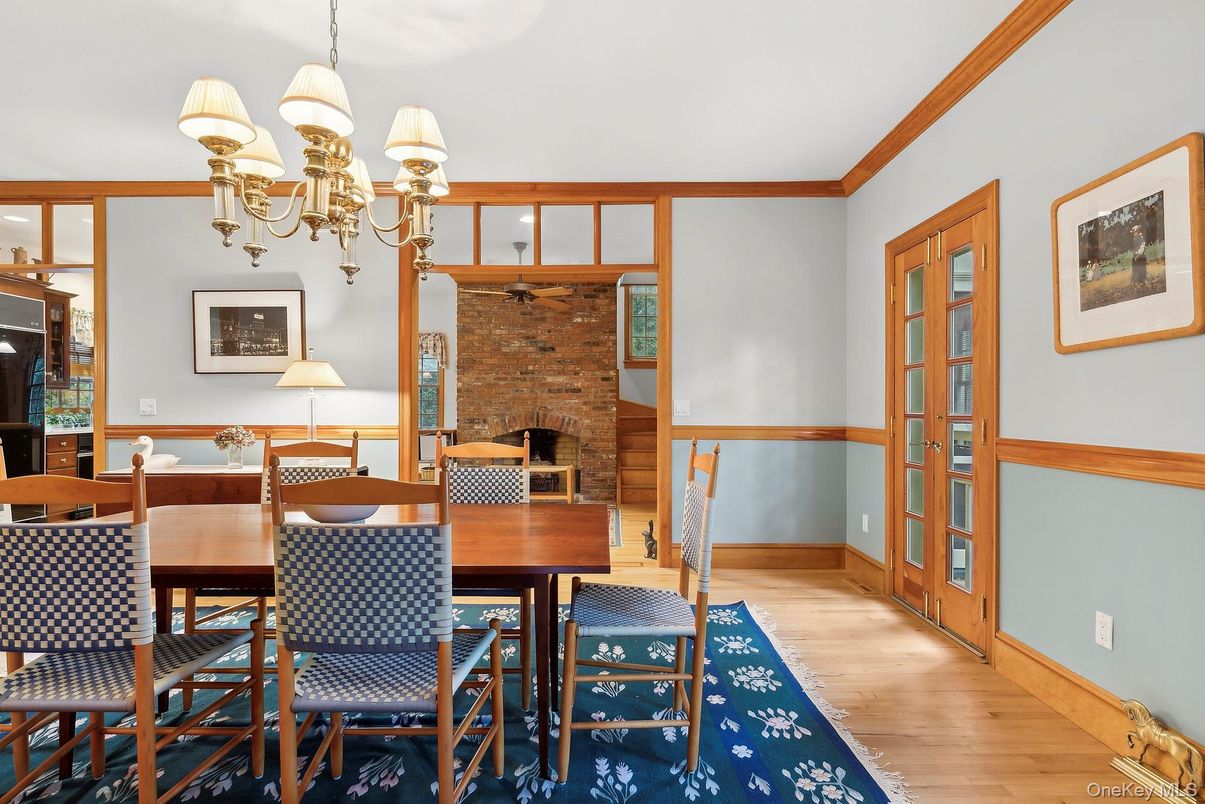 Chandelier, Dining room, Fireplace, Interior, Stone Walls, Wood Texture Flooring