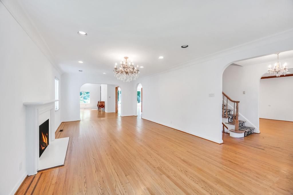 Chandelier, Empty room, Fireplace, Interior, Recessed Lighting, Wood Texture Flooring