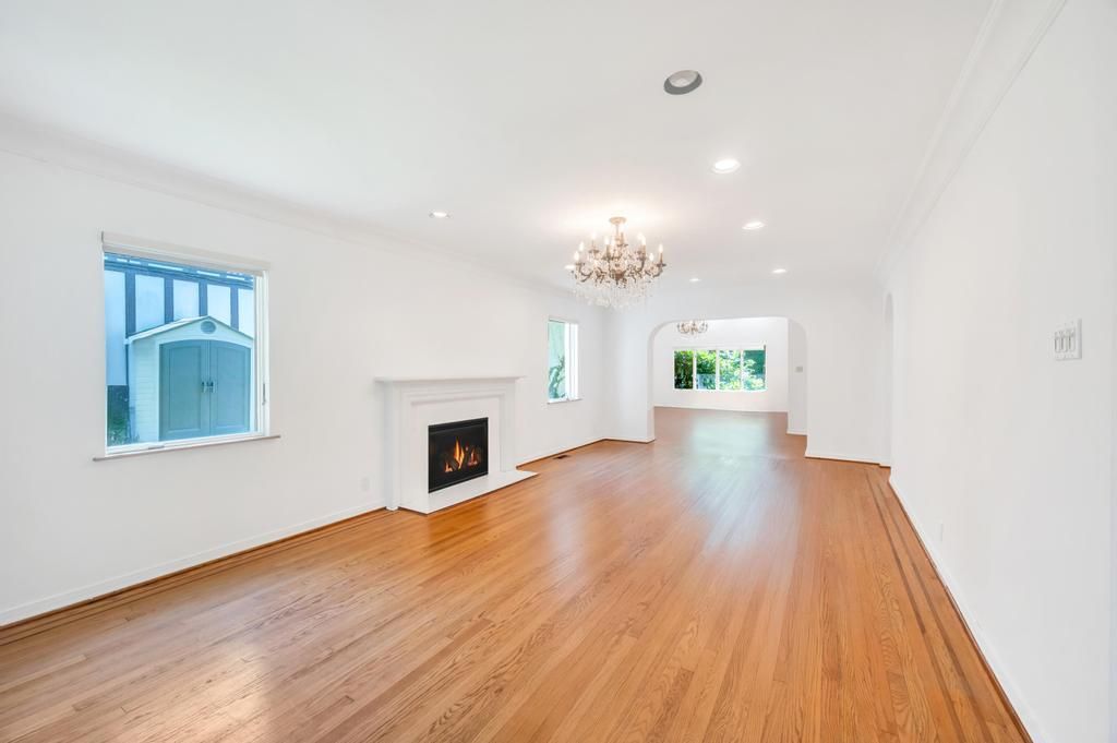 Chandelier, Empty room, Fireplace, Interior, Recessed Lighting, Wood Texture Flooring