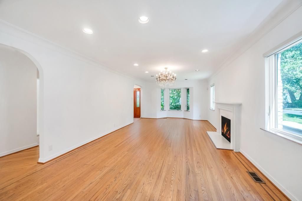 Chandelier, Empty room, Fireplace, Interior, Recessed Lighting, Wood Texture Flooring