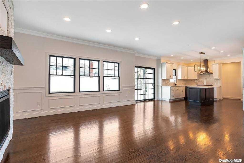 Empty room, Fireplace, Interior, Kitchen, Pendant Lights, Recessed Lighting, Wood Texture Flooring