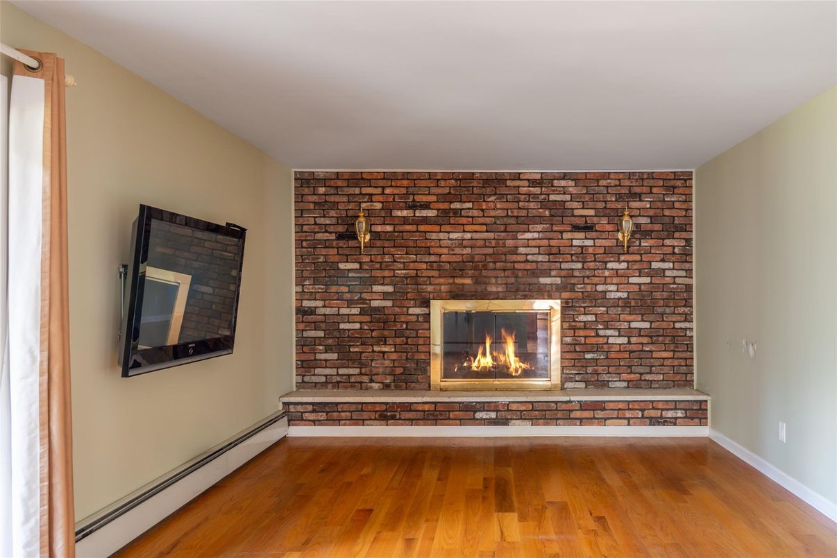 Empty room, Fireplace, Interior, Stone Walls, Wood Texture Flooring