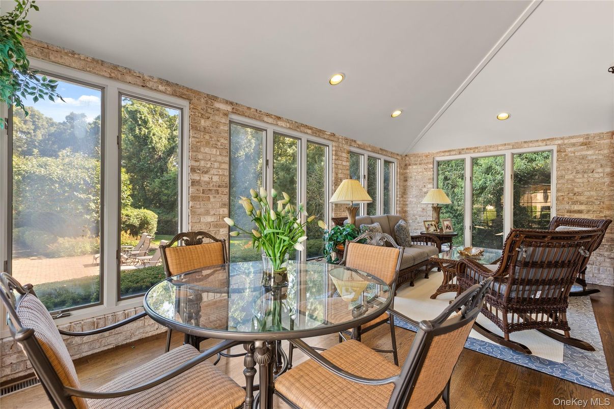 Dining room, Interior, Recessed Lighting, Stone Walls, Sun Room, Wood Texture Flooring