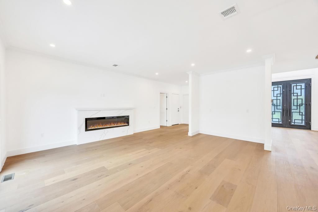 Empty room, Fireplace, Interior, Recessed Lighting, Wood Texture Flooring