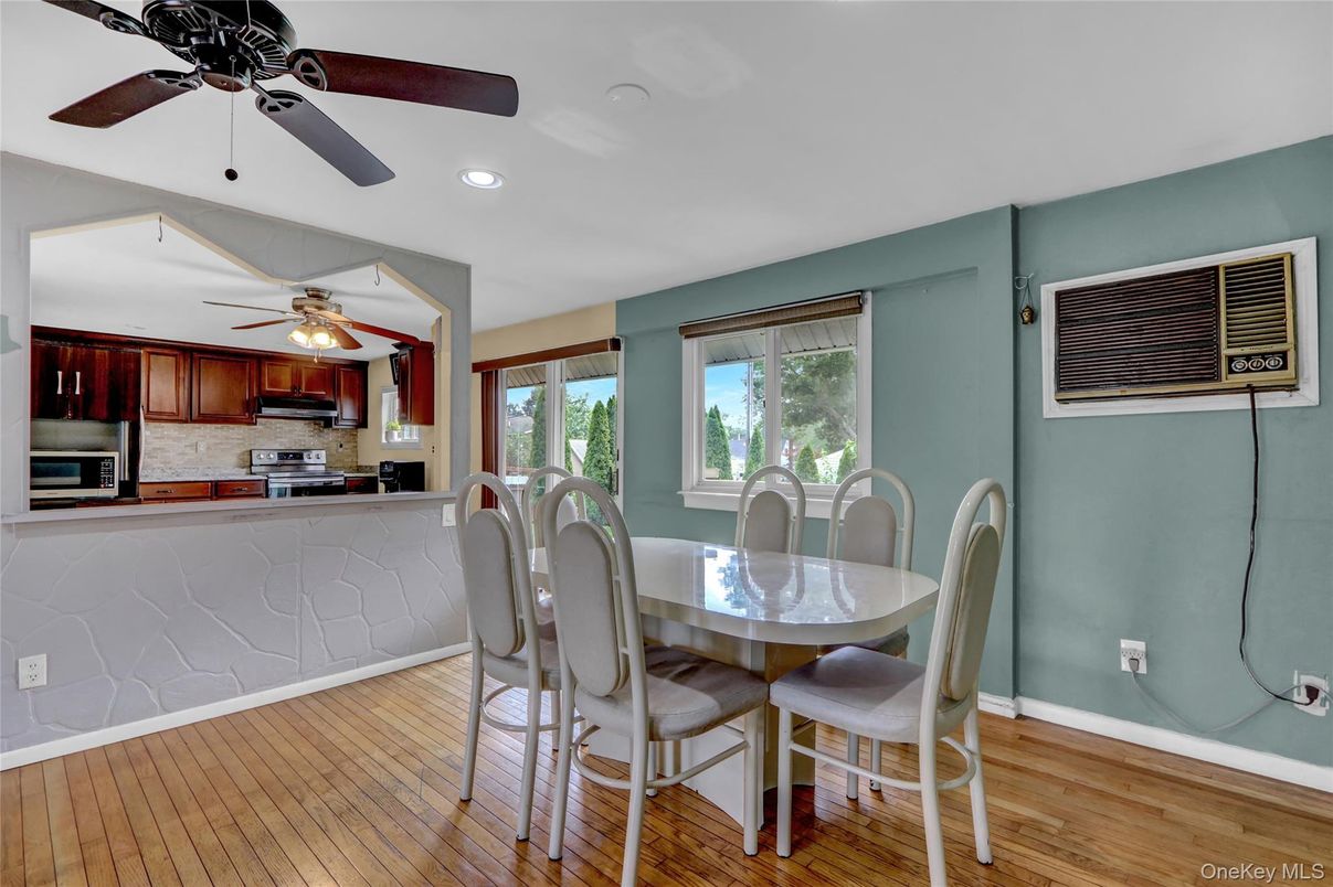 Dining room, Interior, Kitchen, Recessed Lighting, Stainless Steel Appliances, Wood Texture Flooring