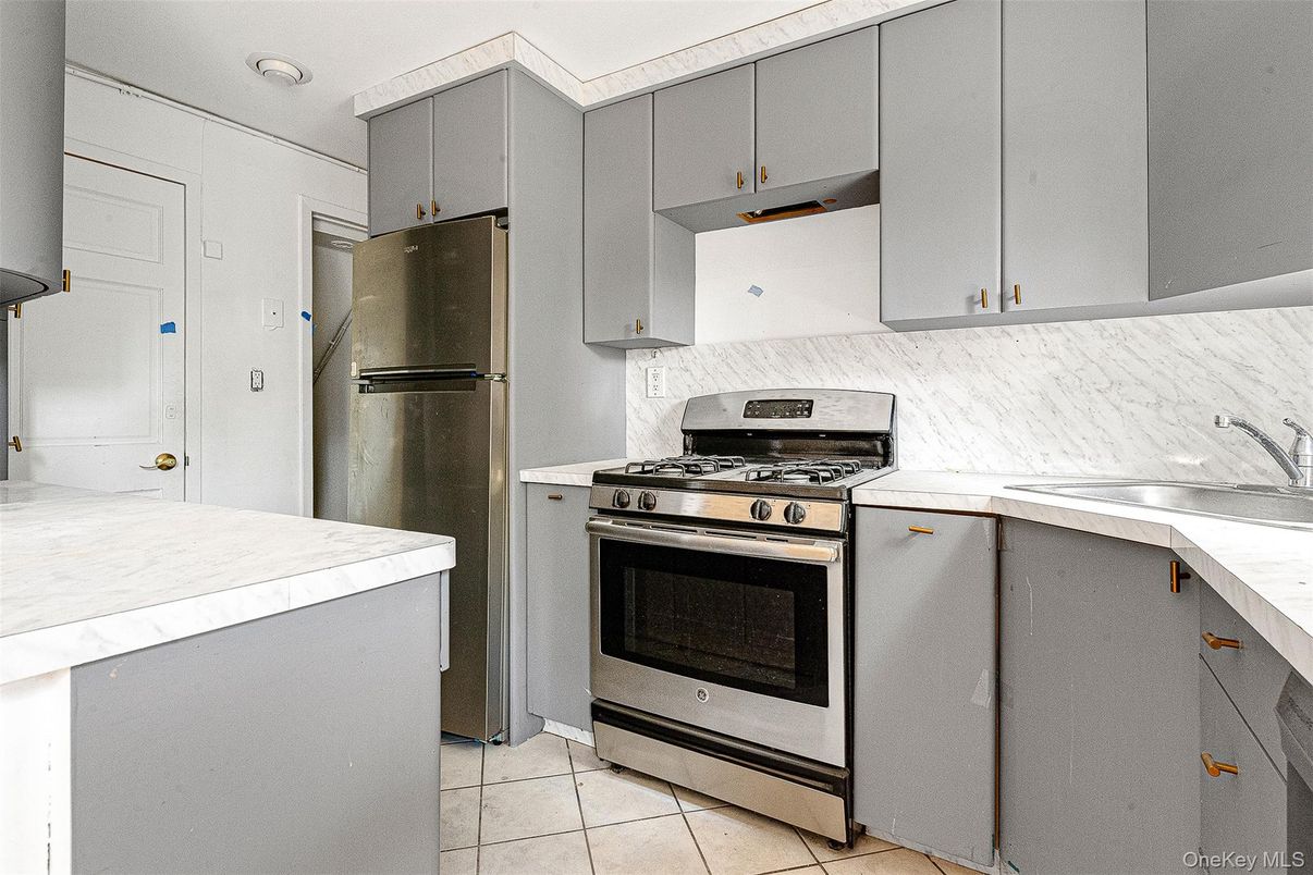 Interior, Kitchen, Marble Walls, Stainless Steel Appliances